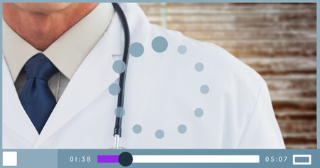 Composition of male doctor with stethoscope on shoulders on video playback interface screen. medical and healthcare services communication technology concept digitally generated image.の写真素材