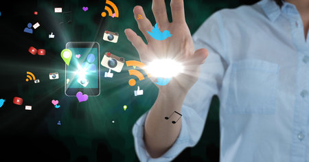Composition of digital online icons floating over businesswoman's hand. global technology,...