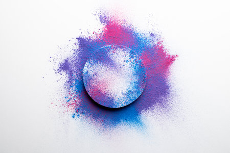 Close up of multi coloured powder with white circle and copy space on white background. Holi festival, colour, hindu tradition and celebration concept.の写真素材