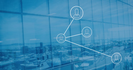 Image of network of profile icons against view of cityscape from office building. Global networking and business technology conceptの写真素材