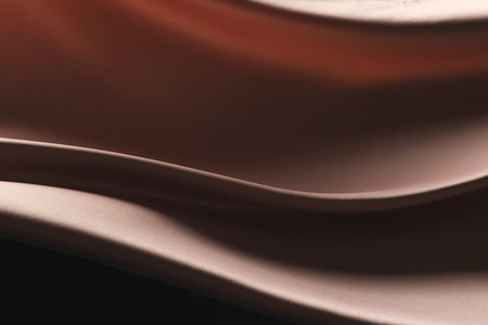 Close up of pink shiny silk fabric with copy space background. Texture, fabric, cloth, colour and material.の写真素材