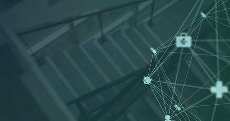 Image of connected icons forming globe over high angle view of staircase of building. Digital...