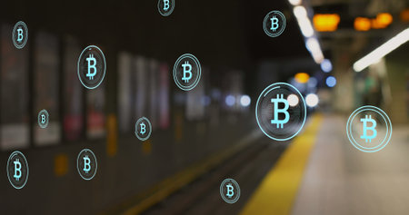 Image of multiple bitcoin symbols floating against blurred view of train arriving at a station....