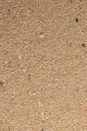 Close up of sand grains and copy space background. Sand, texture, shape and colour concept.