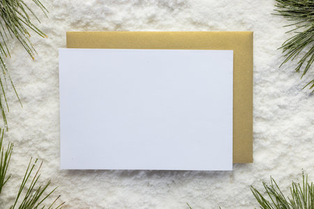 Christmas decorations and white card with copy space on snow background. Christmas, decorations,...
