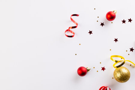 Christmas stars, baubles decorations with copy space on white background. Christmas, decorations, tradition and celebration concept.の写真素材