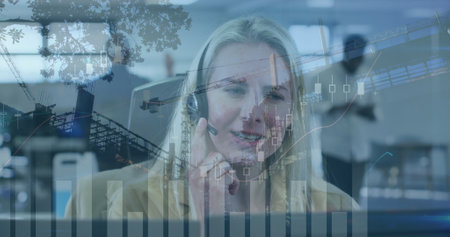 Image of statistics over colleagues working together in an office. Digital interface and global...