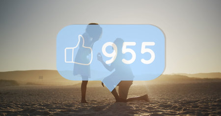 Like icon and increasing numbers against man proposing his girlfriends with a ring on the beach....