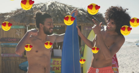 Image of red heart love emojis digital icons over men holding surfboard on beach. digital interface,...