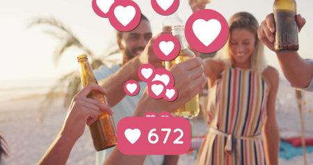 Image of heart icons and numbers over friends making toast with beer bottles on beach. digital...
