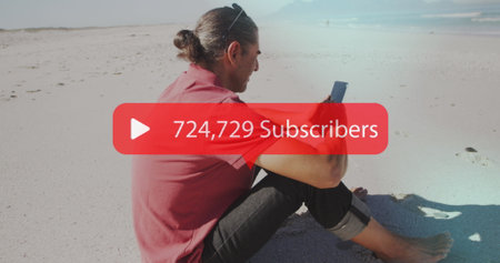 Image of speech bubble with subscribers text and numbers over man using smartphone on beach. digital...