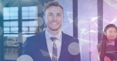 Image of network of connections over diverse business people in office. Global finance, business, connections, computing and data processing concept digitally generated image.の写真素材