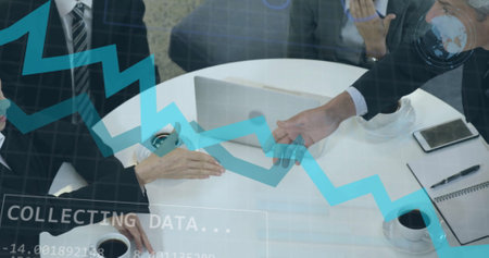 Image of data processing over diverse business people in office. Global finance, business, connections, computing and data processing concept digitally generated image.の写真素材