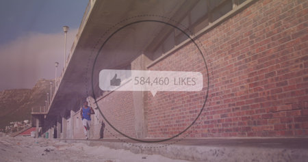 Speech bubble with increasing likes against african american fit man running on the street. sports,...