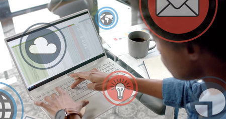 Image of digital icons processing over african american businessman in office. Global finance,...