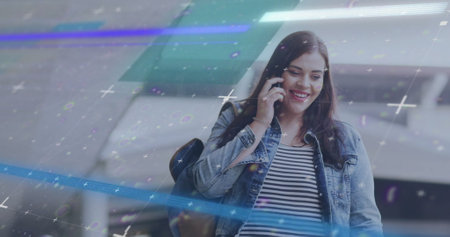Image of data processing over caucasian woman using smartphone. Global networks, digital interface,...