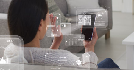 Image of data on screens over caucasian woman with smartphone. Global networks, business, finances,...