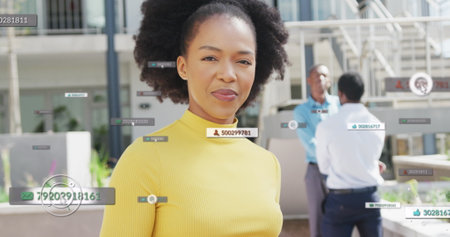 Image of icons and numbers with data processing over african american businesswoman. Global...