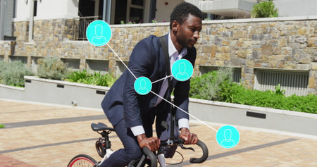 Image of connections with data processing over african american businessman with bike. Global...