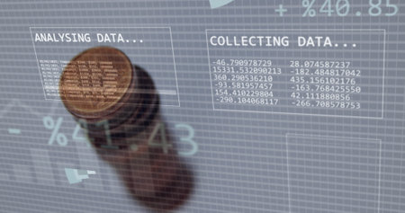 Image of financial data over coins. Global business, finances, computing and data processing concept...