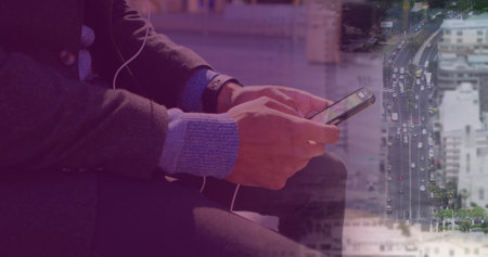 Image of biracial businessman on phone over cityscape. Global business, finances, digital interface, computing and data processing concept digitally generated image.の写真素材