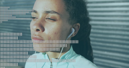 Music equalizer against close up of african american woman wearing earphones. music and technology conceptの写真素材