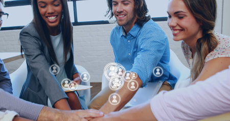 Image of network of icons over diverse business people in office. Global business, digital...