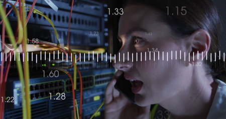 Image of data processing over caucasian female it engineer by computer servers. Global data processing, servers and cloud computing concept digitally generated image.の写真素材