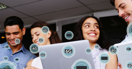 Image of 6g texts over diverse business people using technology. Global business and digital interface concept digitally generated image.の写真素材