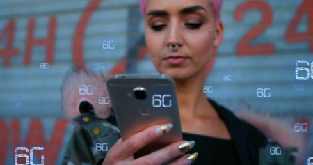 Image of 6g texts over biracial woman using smartphone. Global business and digital interface concept digitally generated image.の写真素材