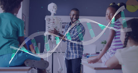 Image of dna strand over smiling african american male teacher showing pupils skeleton in class. Biology, science, school, education, childhood and learning, digitally generated image.の写真素材