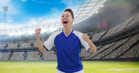 Image of biracial female soccer player over stadium. Global sport, patriotism and digital interface concept digitally generated image.の写真素材