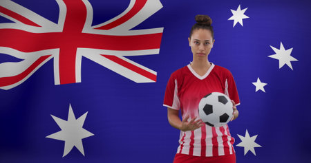 Image of biracial female soccer player over flag of australia. Global sport, patriotism and digital interface concept digitally generated image.の写真素材
