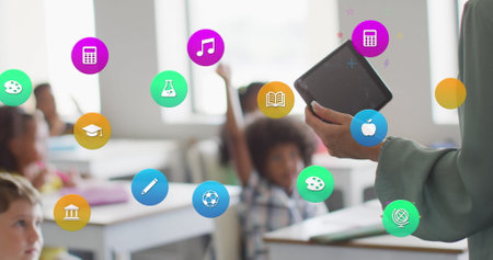 Image of school icons over diverse pupils and biracial female teacher using tablet in classroom. Communication, technology, school, education, childhood and learning, digitally generated image.の写真素材