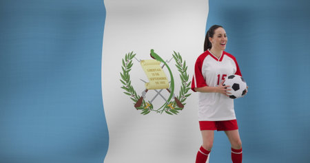 Image of caucasian female soccer player over flag of guatemala. Global sport, patriotism and digital interface concept digitally generated image.の写真素材
