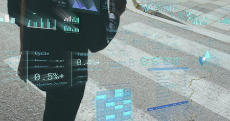 Image of financial data processing over man crossing street. Global business, finances, computing...