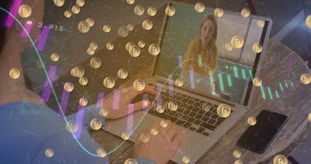 Image of bitcoins and statistics over woman using laptop on image call in background. Digital interface global connection and communication concept digitally generated image.の写真素材