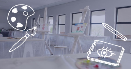 Image of palette, paint brush, pencil and sketchbook over paintings on easels in art classroom. Creativity, school, education and learning, digitally generated image.の写真素材