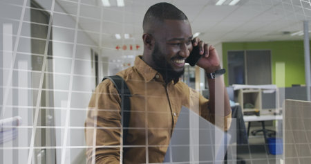 Image of data processing over african american businessman working in office. Global business and...