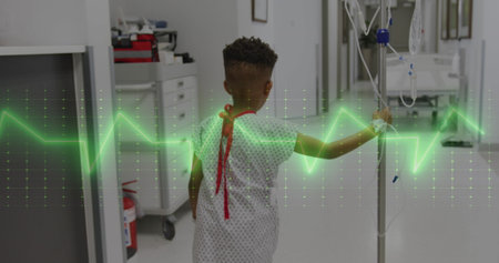 Image of medical data processing over biracial boy patient with drip. Global medicine, healthcare,...