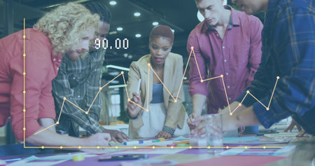 Image of data processing over diverse business people working in office. Global business and digital...