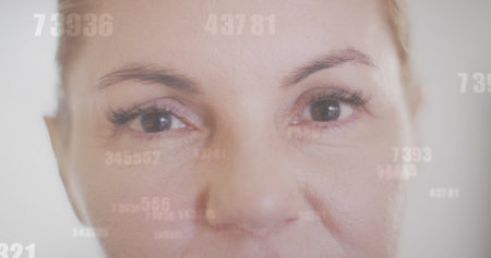 Image of medical data processing over caucasian female doctor in hospital. Global medicine,...