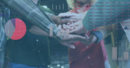 Image of data processing over diverse business people working at office. Global business and digital...