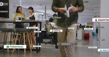 Image of financial data processing over diverse business people in office. Global business, finances, computing and data processing concept digitally generated image.の写真素材