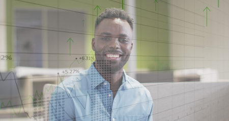 Image of financial data processing over biracial businessman. Global business, finances, computing...