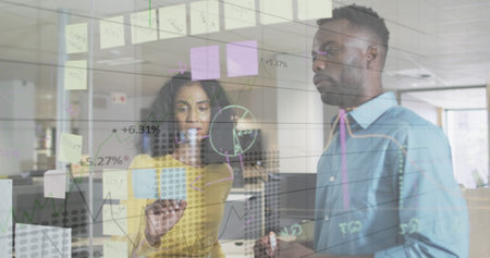 Image of financial data processing over diverse business people in office. Global business,...