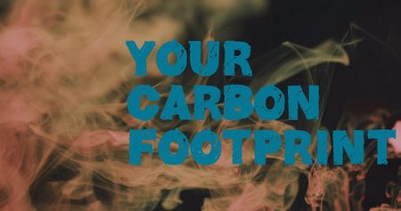 Image of your carbon footprint text over orange liquid on black background. Environment, communication and background design concept digitally generated image.の写真素材