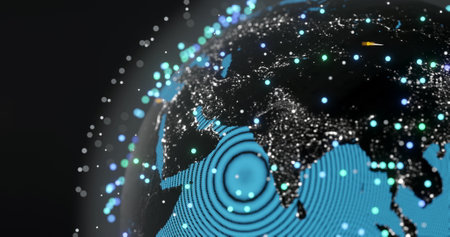 Image of glowing blue mesh of connections with icons over globe on black background. Global...