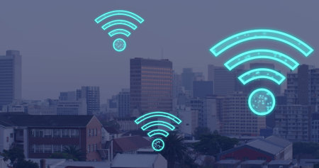 Image of digital wifi icons flying over cityscape. Global internet networks, computing, connections and data processing concept digitally generated image.の写真素材