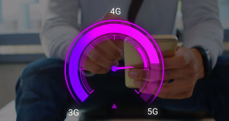 Image of purple speedometer over hands of caucasian businessman using smartphone. Internet speed, transfer, communication and technology concept digitally generated image.の写真素材